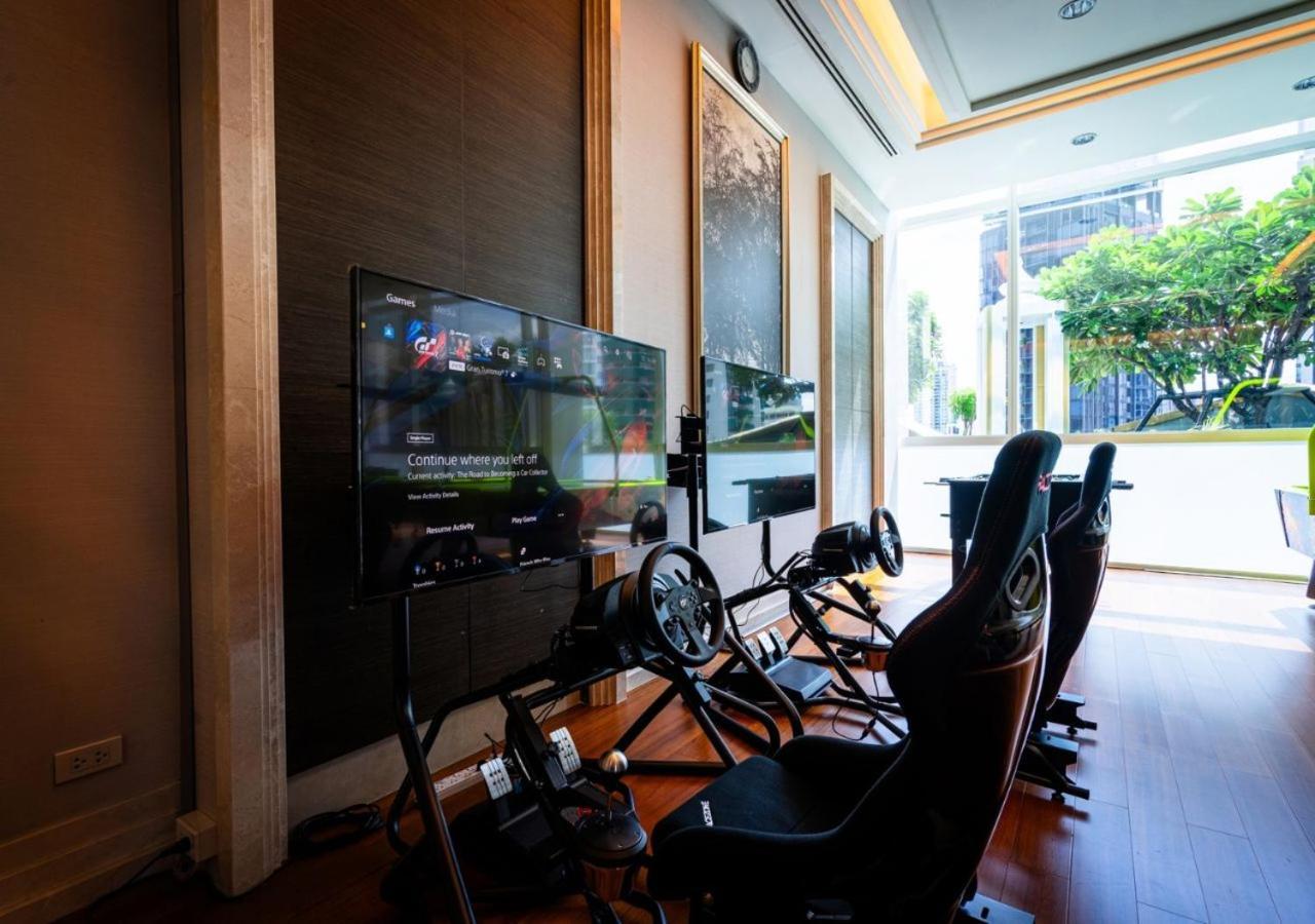 Grande Centre Point Hotel Terminal21 Bangkok Exterior photo A racing simulator